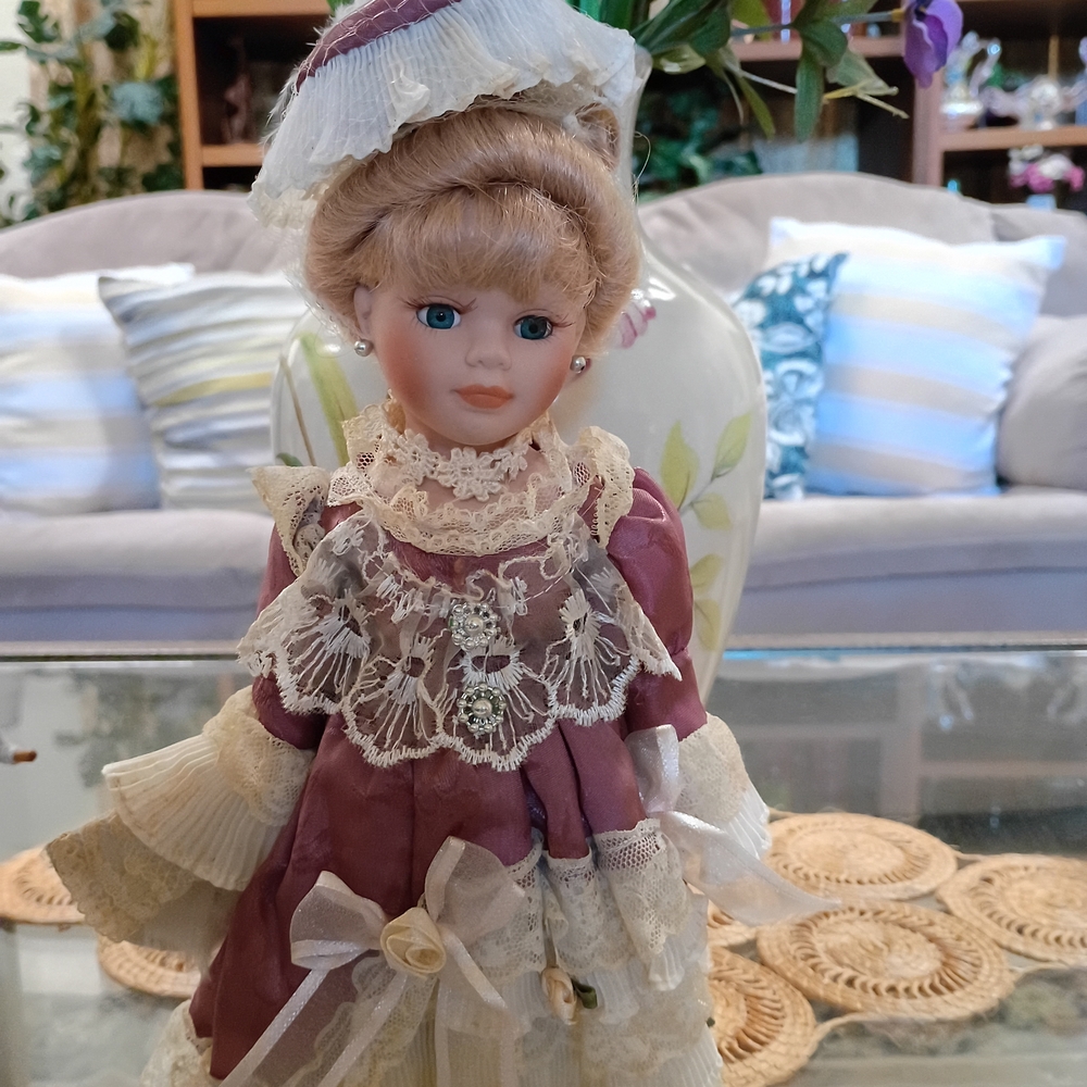 Elegant Porcelain Doll with Lace Dress